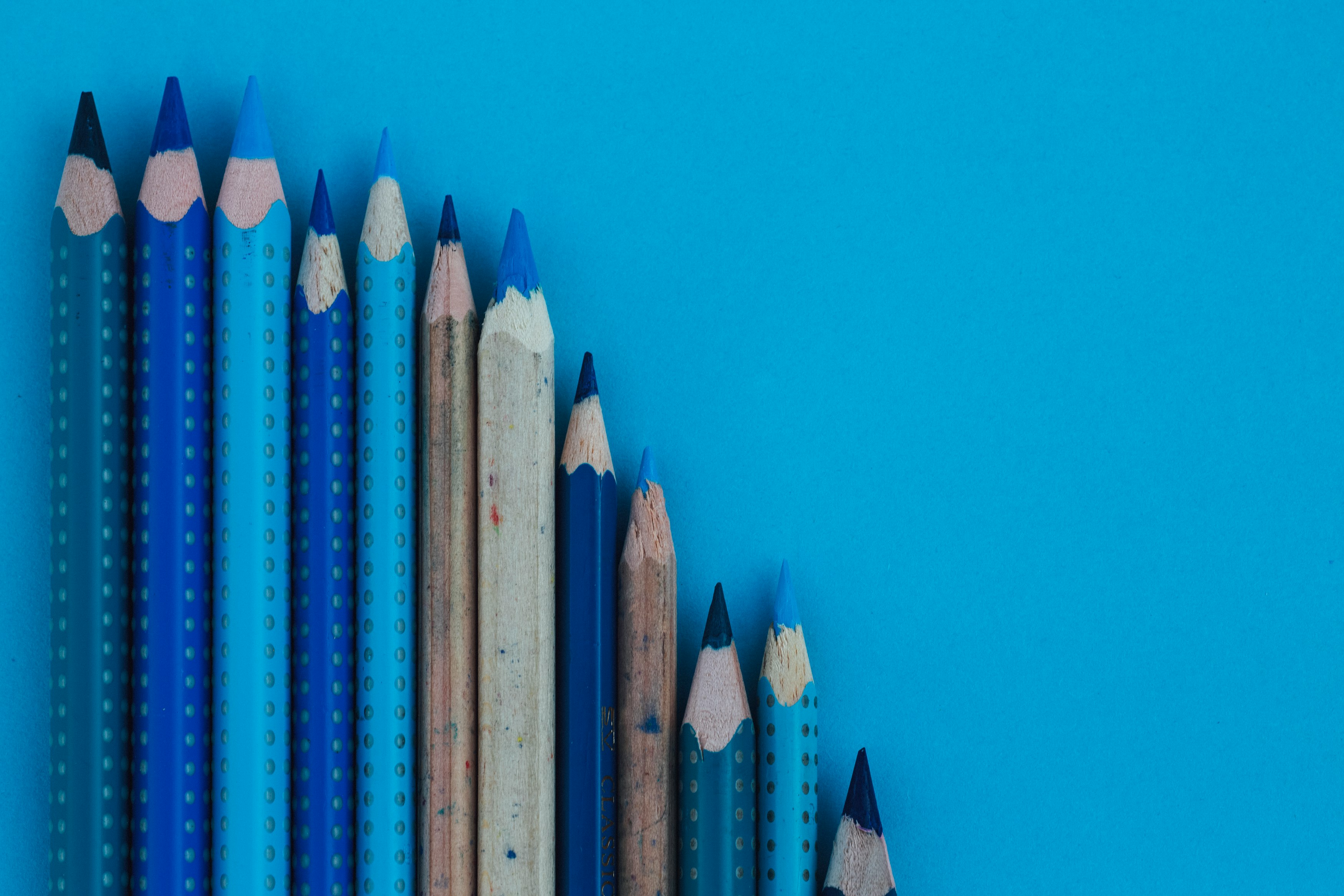 blue and brown wooden pencil